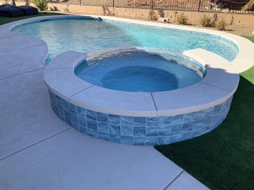 adding hot tub to existing pool